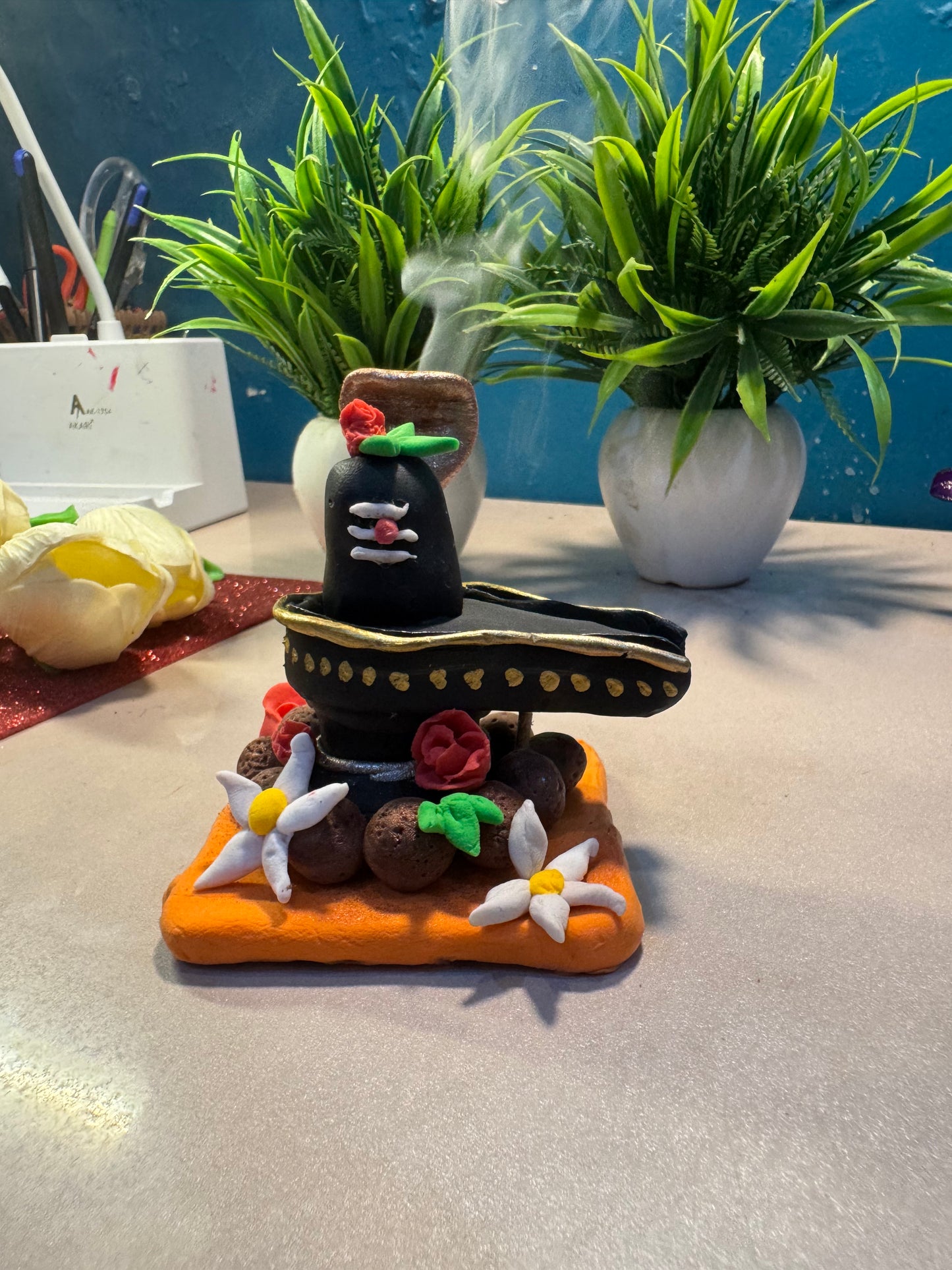Handcrafted Clay Shivling with Floral Base – Miniature Décor Idol